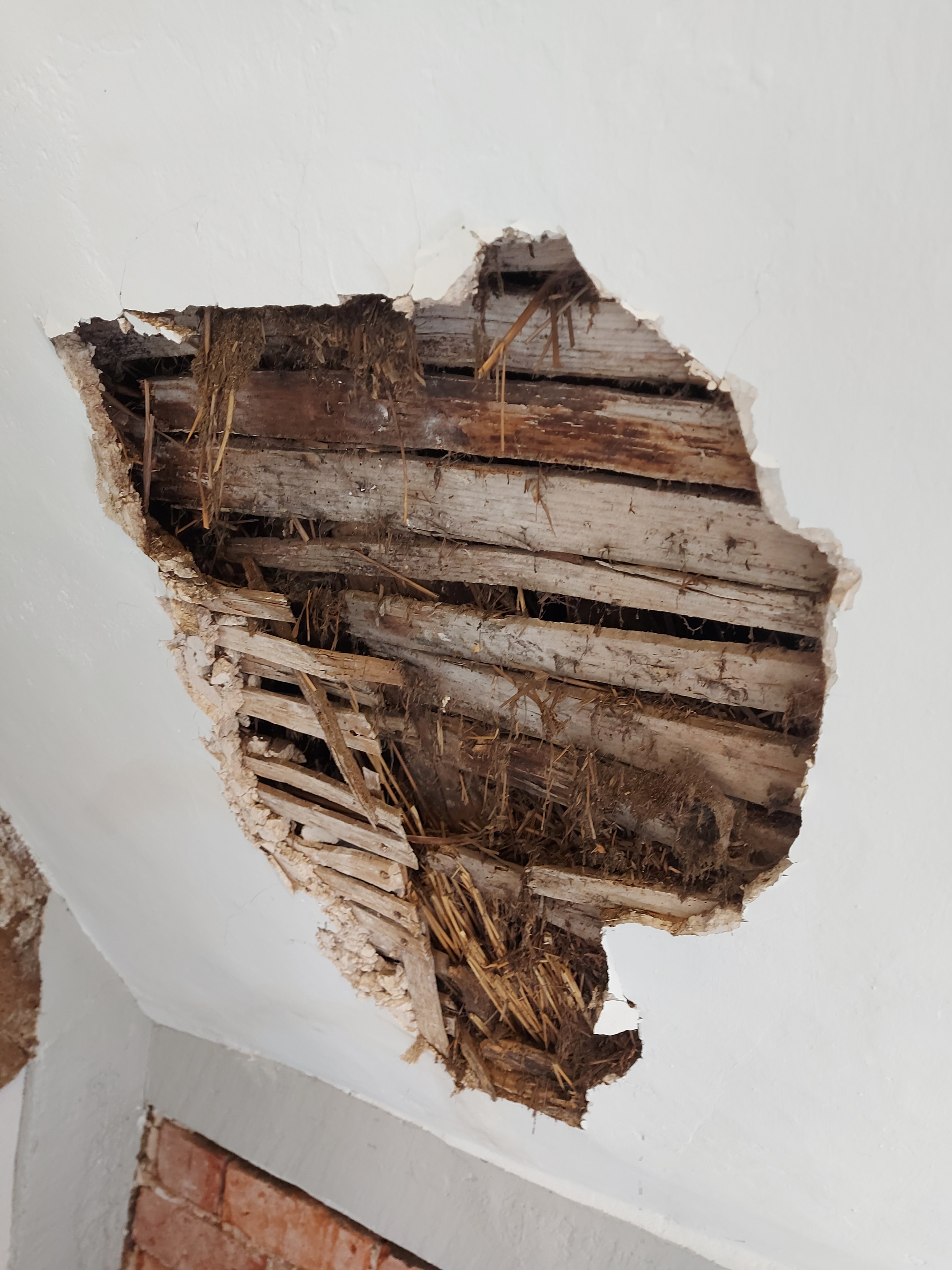 Patch repair blended seamlessly into the existing wall surface